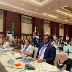 Mr Jamahl Strachan, Parliamentary Secretary voting for the adoption of Resolution 1 and 2.