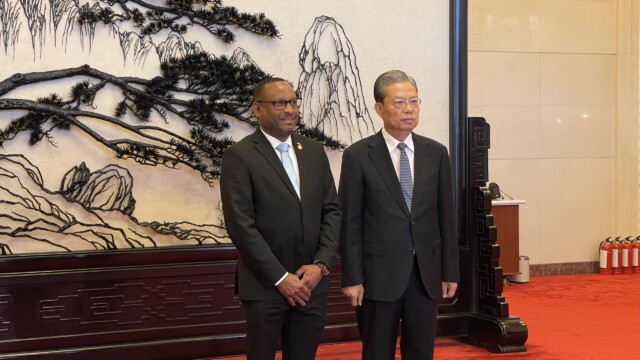 Member of Parliament Mr. Kingsley Smith with Mr. Zhao Leji, Chairman of the National People's Congress Standing Committee.